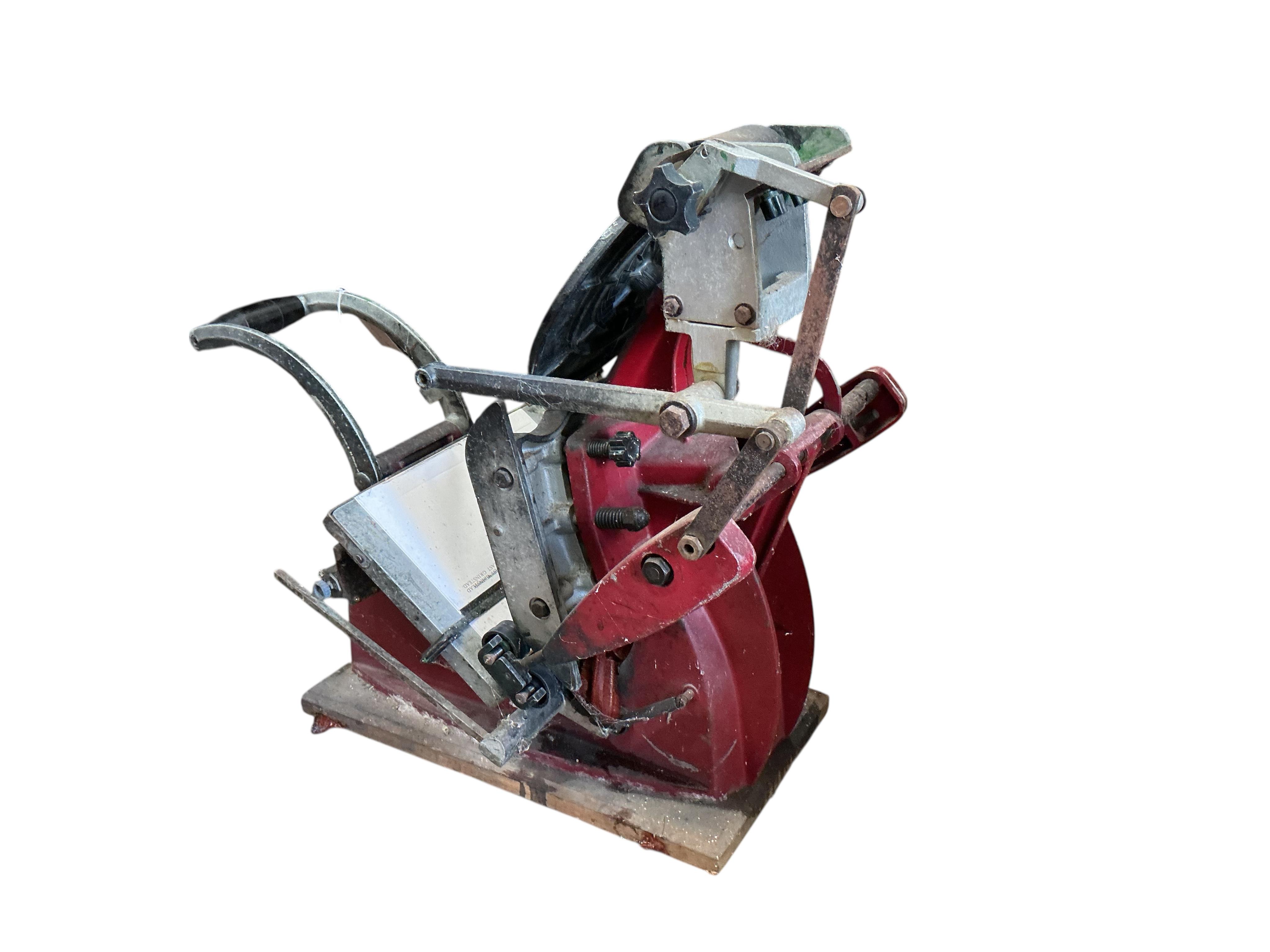 An Adana eight-five printing press with a large quantity of assorted type face, trays, accessories etc.
